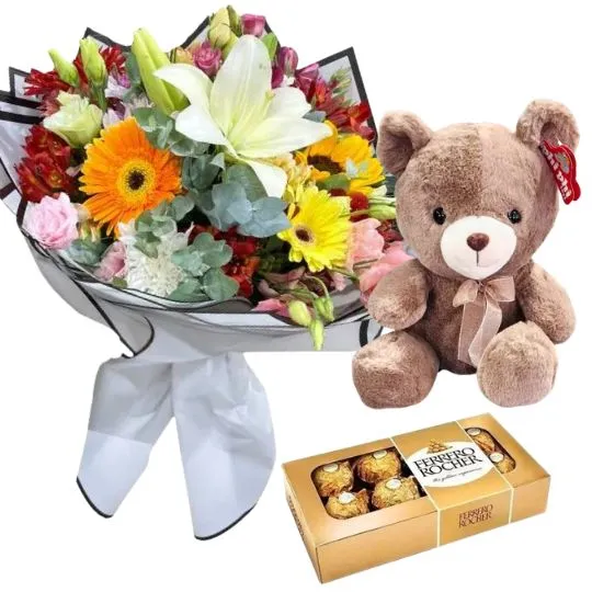 Ramo con flores de estacion con rocher x8 y peluche 